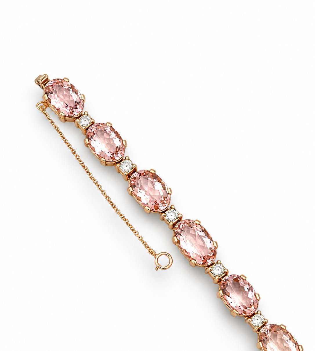 Rose gold bracelet with oval pink morganite stones and small diamond accents