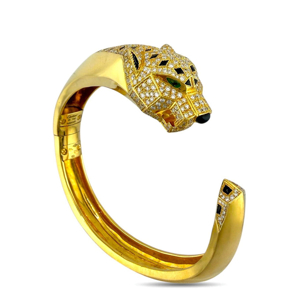 Cartier Panthère de Cartier yellow gold bangle with diamond panther head