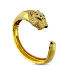 Cartier Panthère de Cartier yellow gold bangle with diamond panther head
