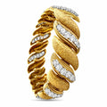 Gold textured link bracelet with diamond accents, curved oval clasp detail