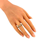 Damiani x Brad Pitt yellow gold diamond ring on a hand