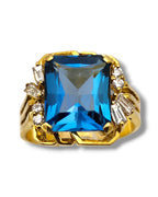 14K Yellow Gold Emerald Cut Blue Topaz with 0.44ct Halo Diamond Cocktail Ring