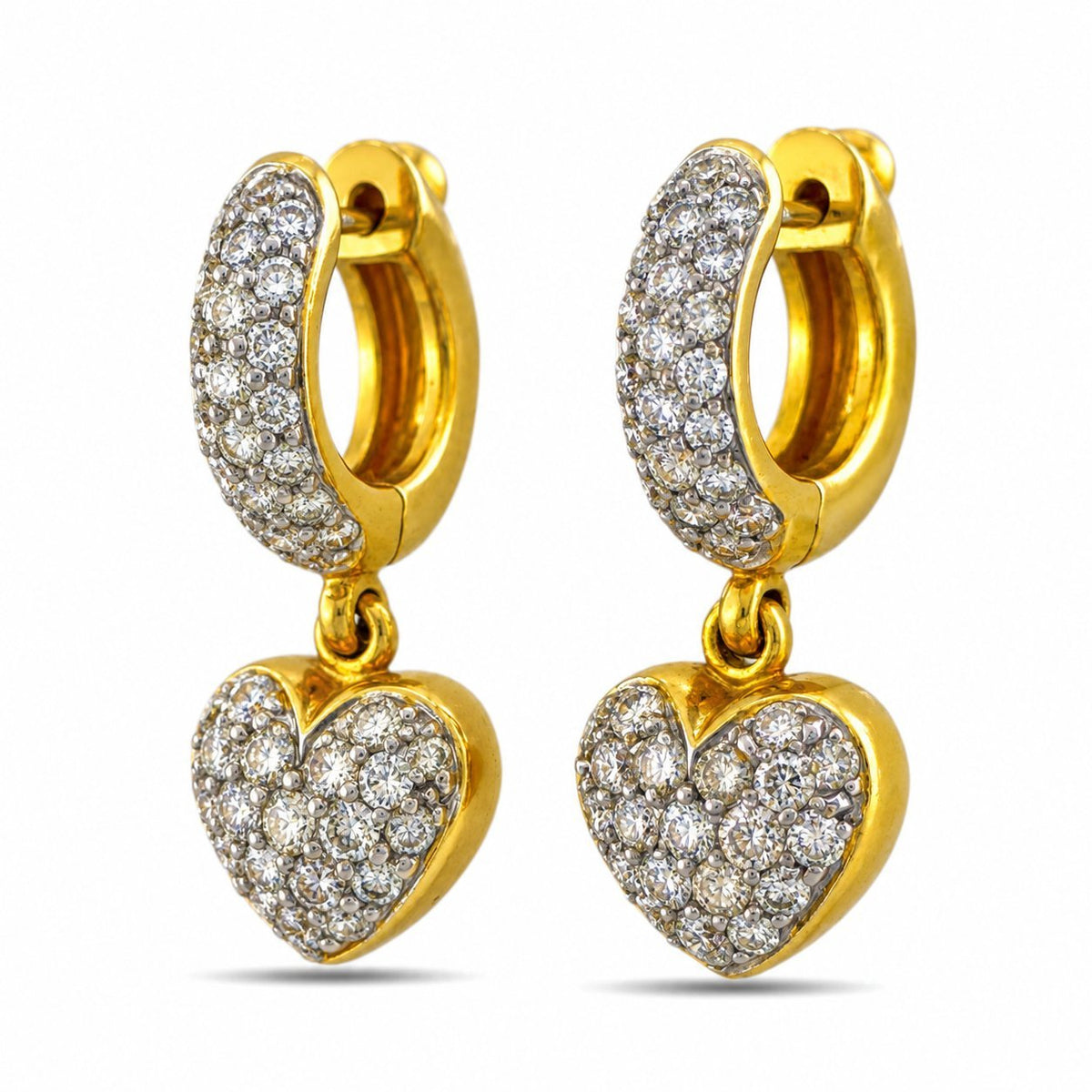 Angled view of gold diamond-set hoop earrings with dangling diamond hearts