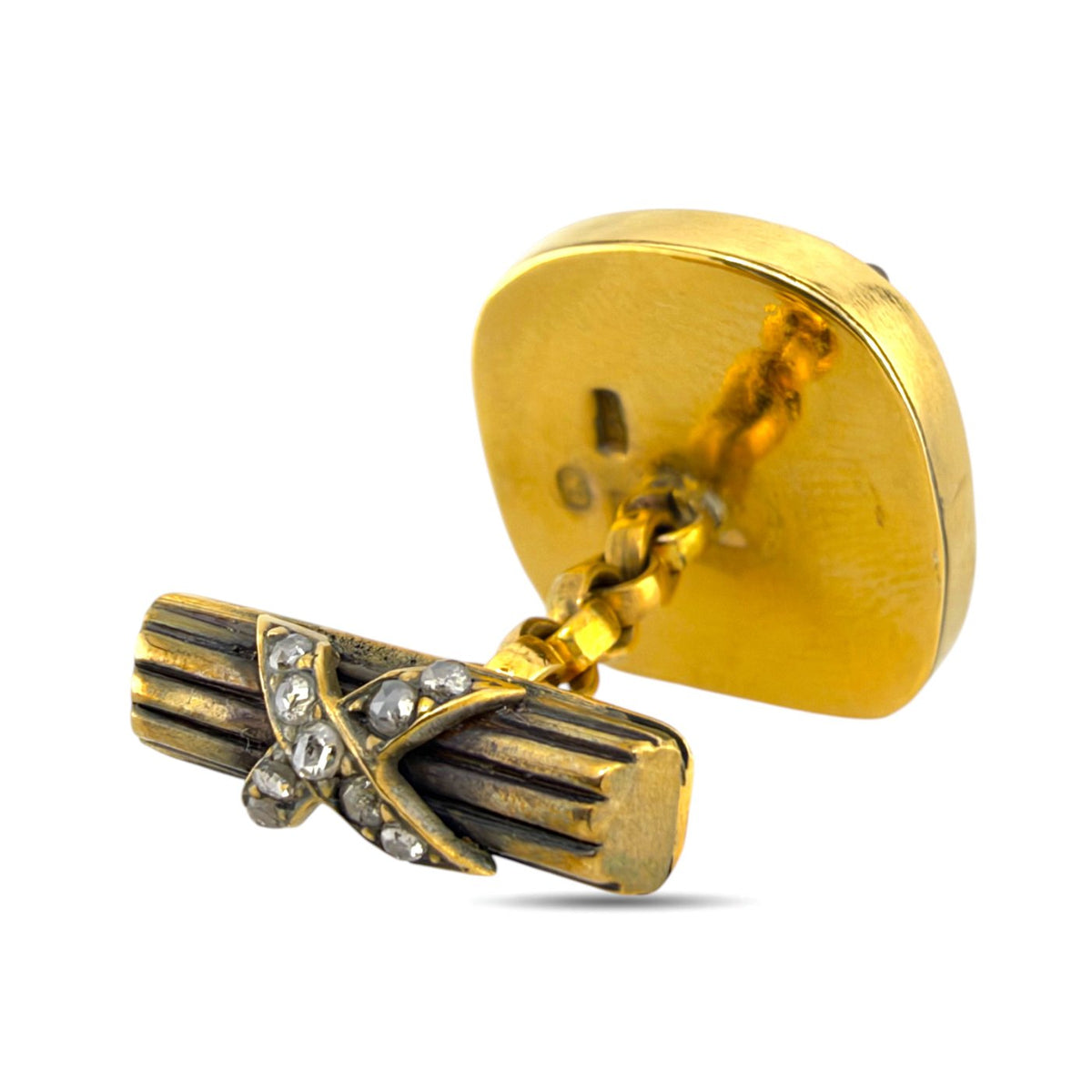 Faberge 14K yellow gold cufflink with ruby, diamond, and blue enamel crest