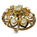 Yellow gold cocktail ring with round diamonds and black enamel accents, close-up top