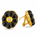 Black onyx flower clip-on earring with diamond center and visible gold clip fastening
