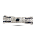 Diamond and sapphire bar brooch with round blue center stone and blue striped row design