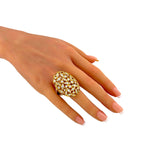 18K yellow gold diamond statement ring on a hand