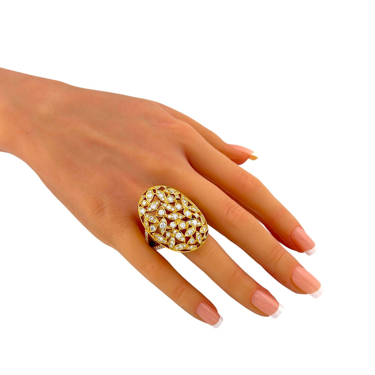 18K yellow gold diamond statement ring on a hand