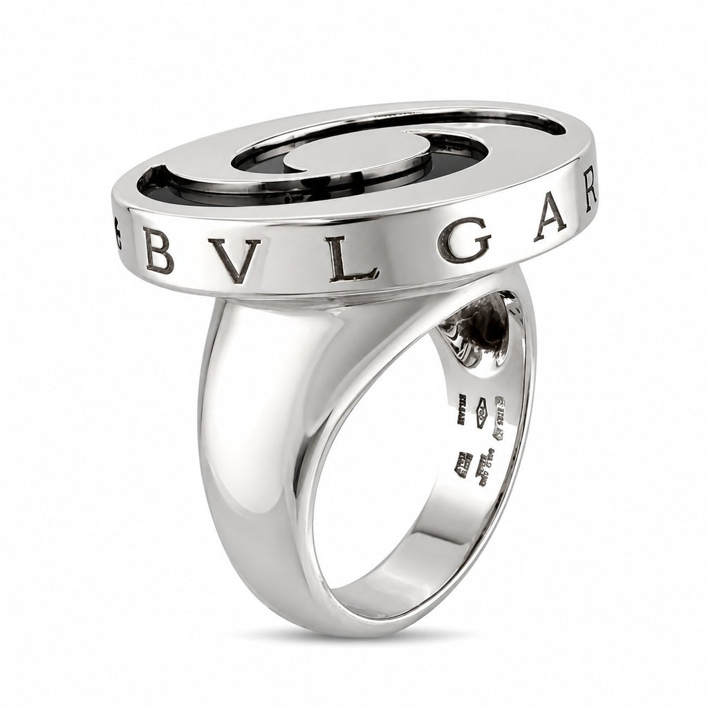 Polished spinning top ring with BVLGARI band and black yin-yang top