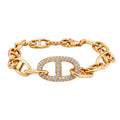 Rose gold link bracelet with oval diamond pavé motif and interlocking chain links