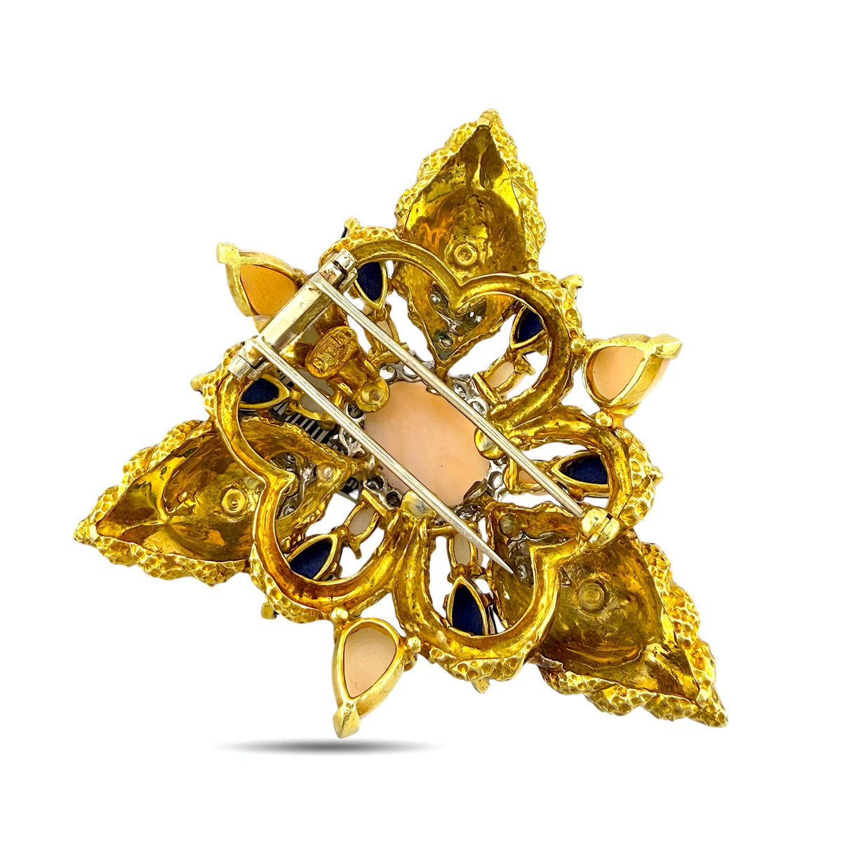 Gold-tone back of floral enamel brooch with pin and clasp hardware