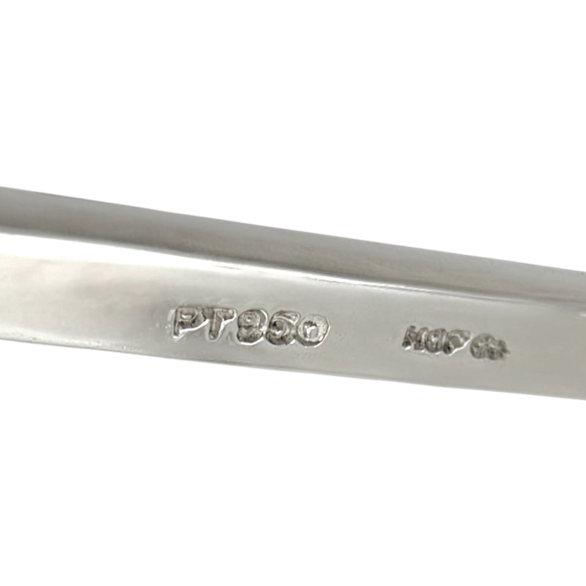 Platinum earring band stamped PT950 and HOF