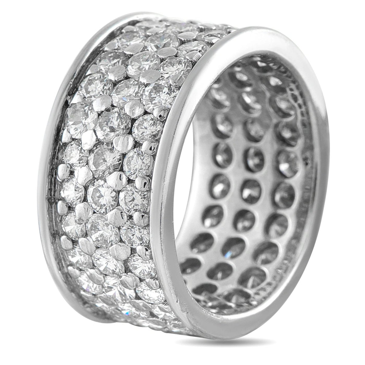 Close-up of white gold wide diamond eternity band ring, side view