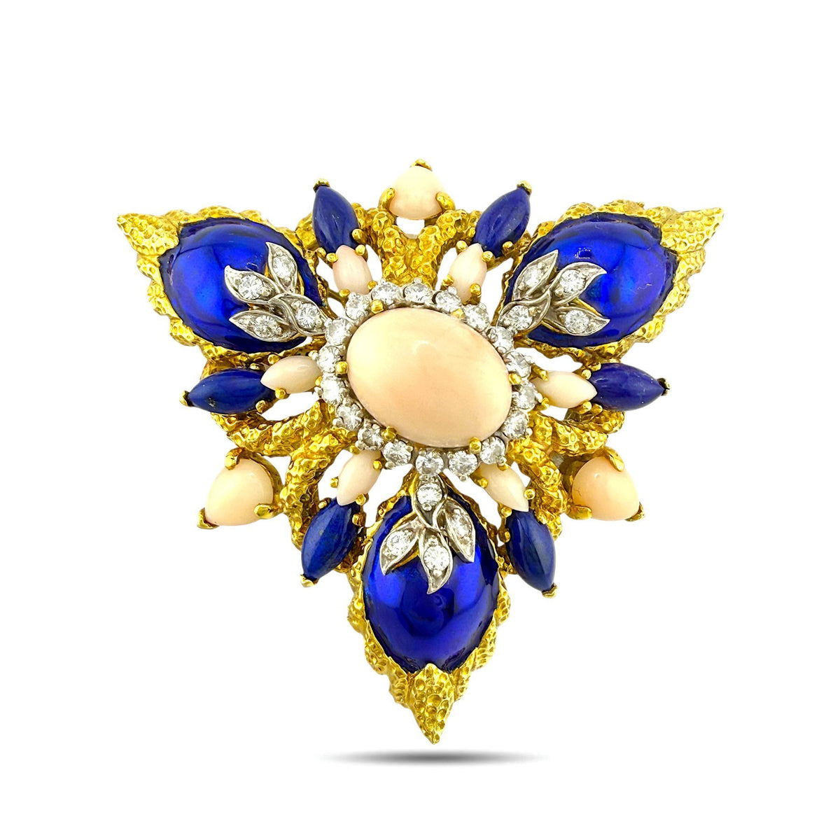 Gold-tone floral enamel brooch with blue teardrop accents, white diamond-like stones