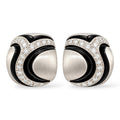 18K white gold diamond earrings with sculpted black enamel accents, shown as a pair