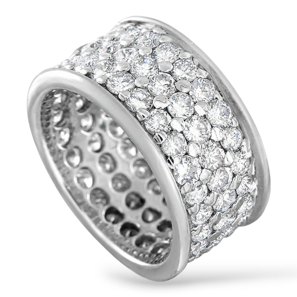 Wide eternity band ring in white gold with channel-set round diamonds