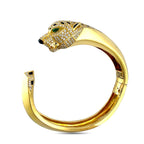 Cartier Panthere de Cartier 18K yellow gold bangle with diamond, emerald and onyx panther head