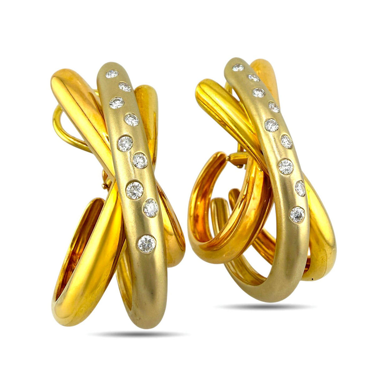 Gold clip-on earrings with diamond inset bar and polished twisted metal loops