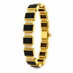 Gold bracelet cuff with rectangular black onyx blocks and small diamond set borders