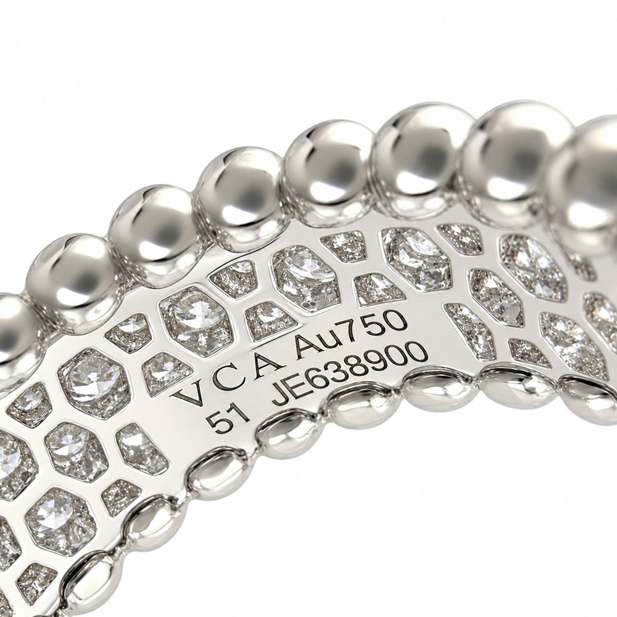 Van Cleef & Arpels Perlee ring interior with diamond settings and engraved markings