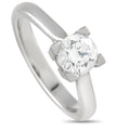 Platinum solitaire engagement ring with round diamond and four-prong setting