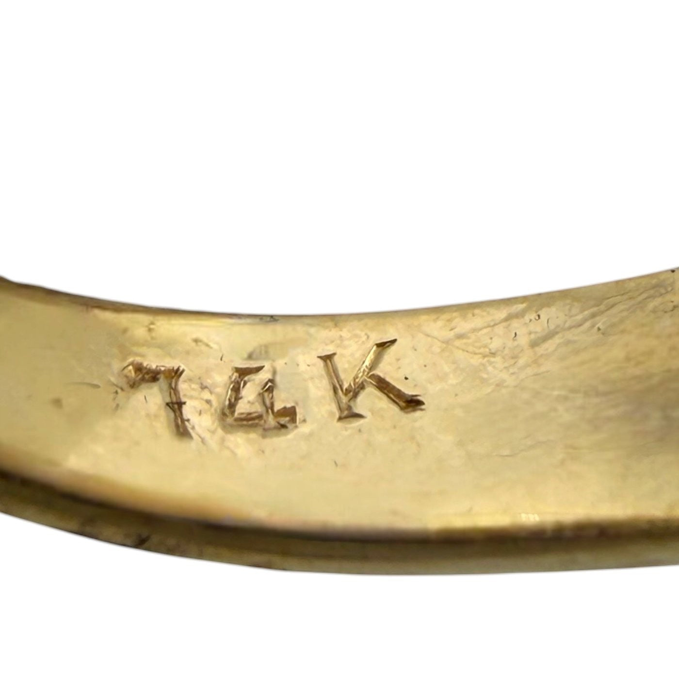 14K stamped inside yellow gold ring band