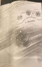 Printed document page with seals and handwritten notes across the surface