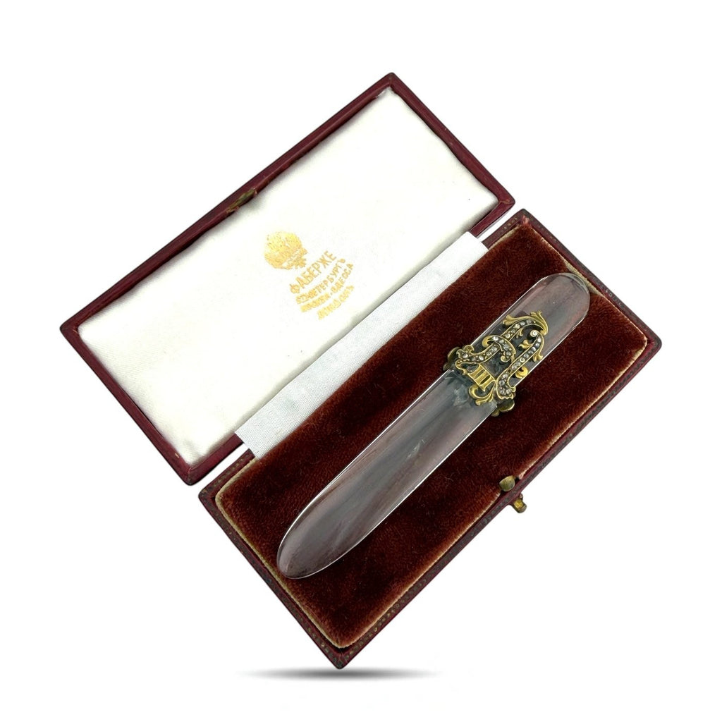 Letter opener in presentation box, clear handle with ornate gold-tone mount and diamond-like accents