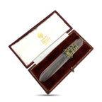 Letter opener in presentation box, clear handle with ornate gold-tone mount and diamond-like accents