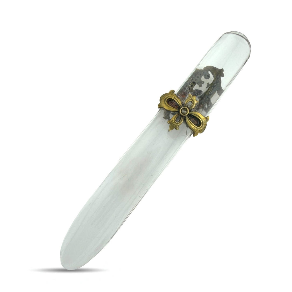 Letter opener with clear blade and decorative gold-tone handle, diamond-like accents