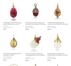 Auction gallery of assorted gold-mounted gemstone egg pendants on necklaces