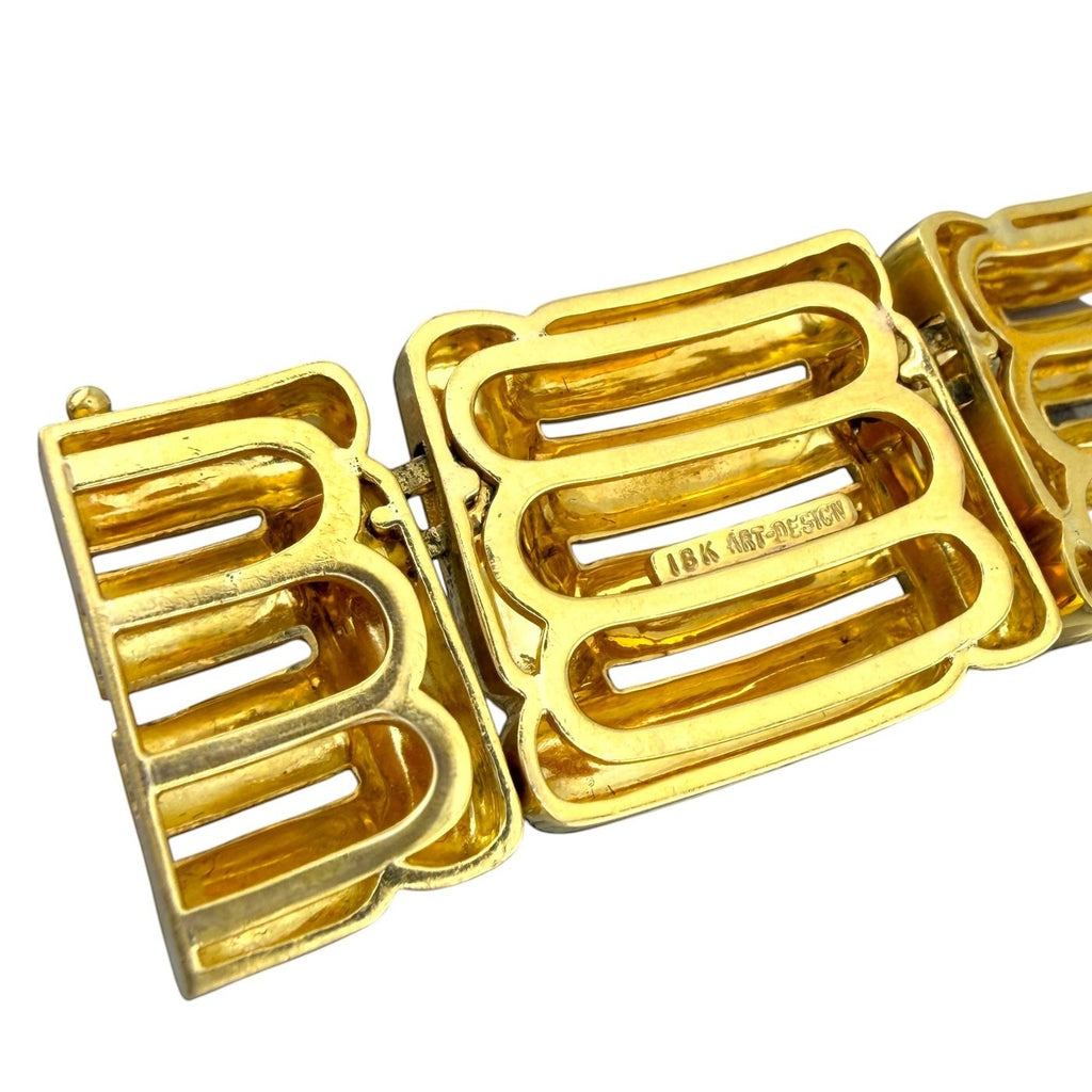 Yellow gold clasp segment with stamped hallmark details
