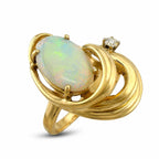 14K yellow gold opal ring with large oval opal and one diamond