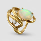 14K yellow gold opal and diamond ring, oval opal in ornate openwork setting