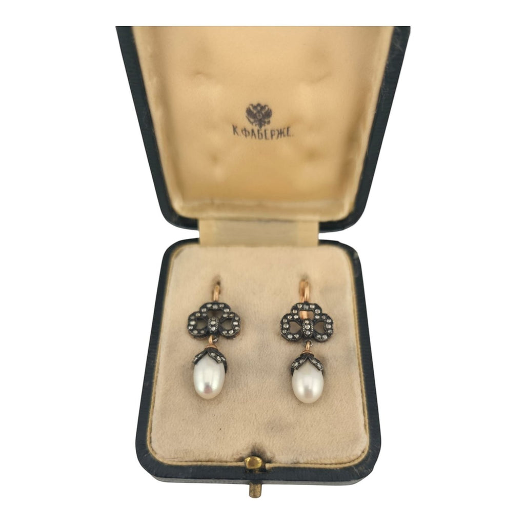 Rose-gold earrings with diamond cluster settings and white teardrop pearls, in box