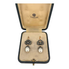 Rose-gold earrings with diamond cluster settings and white teardrop pearls, in box