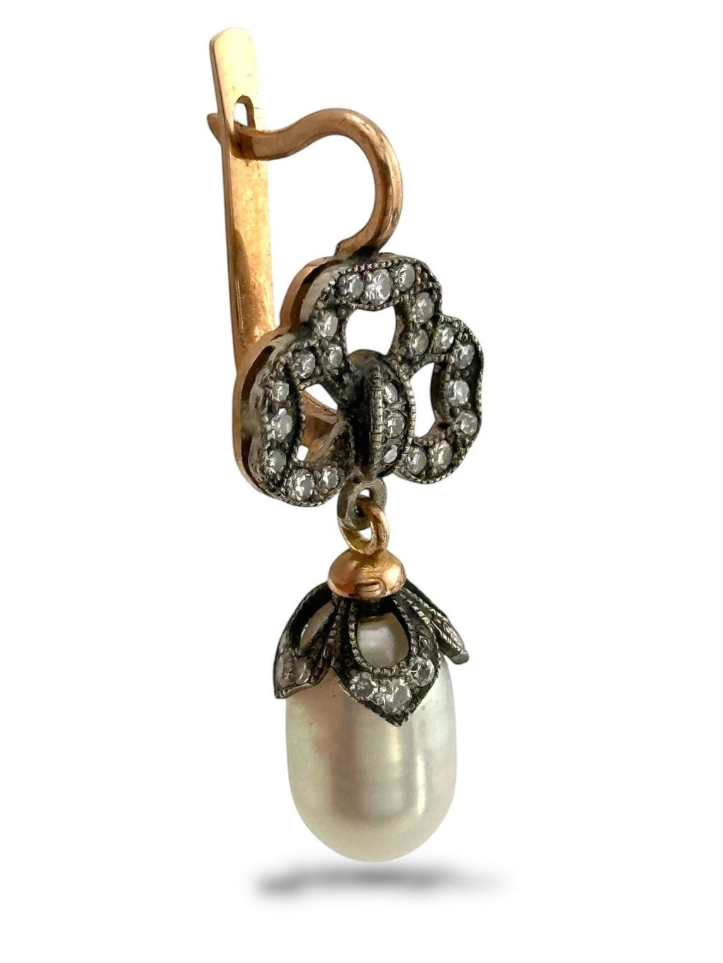 Rose-gold hoop earring with dark diamond cluster and white teardrop pearl