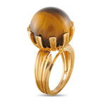 18K yellow gold tiger’s eye ring with domed cabochon and prong details on band
