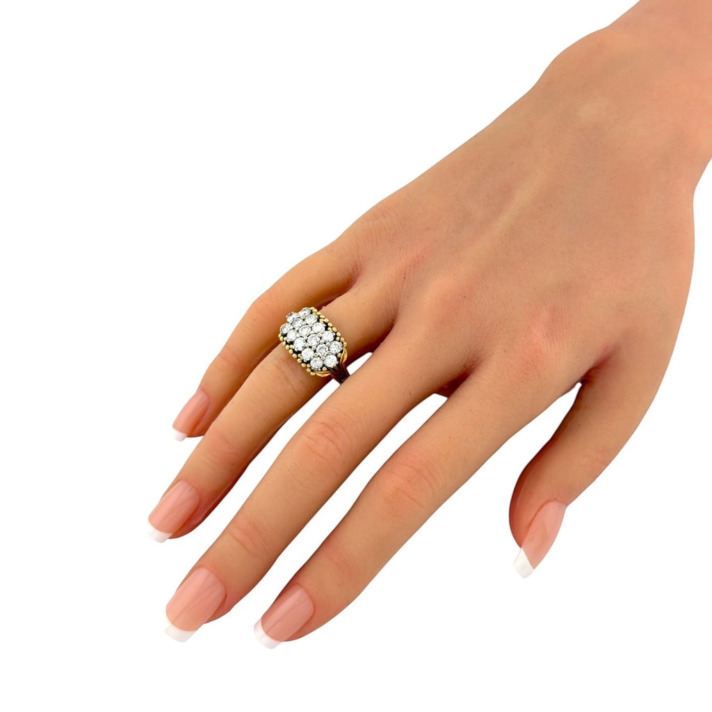Two-tone 14K gold diamond cluster ring on hand, round stones in halo