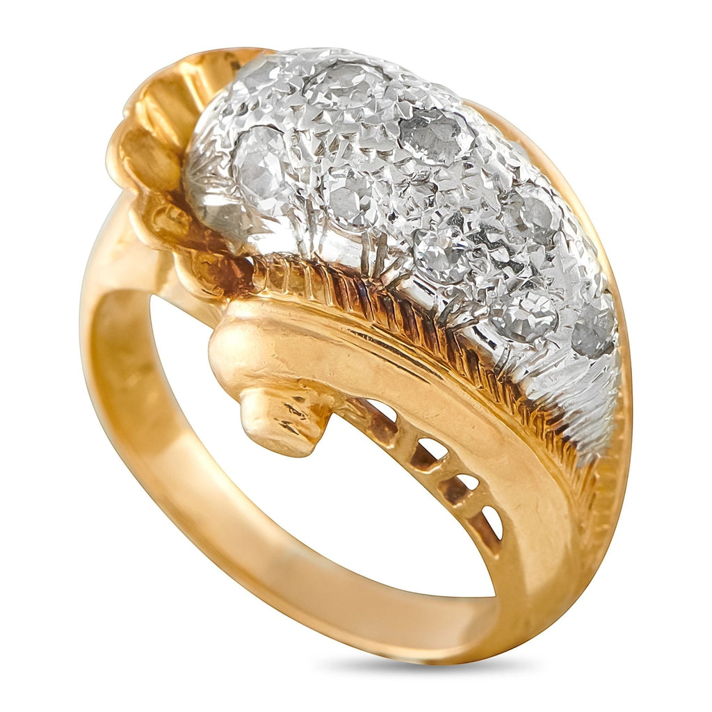 Gold and platinum diamond ring, oval textured diamond top with openwork gold band
