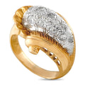 Gold and platinum diamond ring, oval textured diamond top with openwork gold band