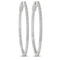 Pair of 14K white gold diamond inside-out hoop earrings