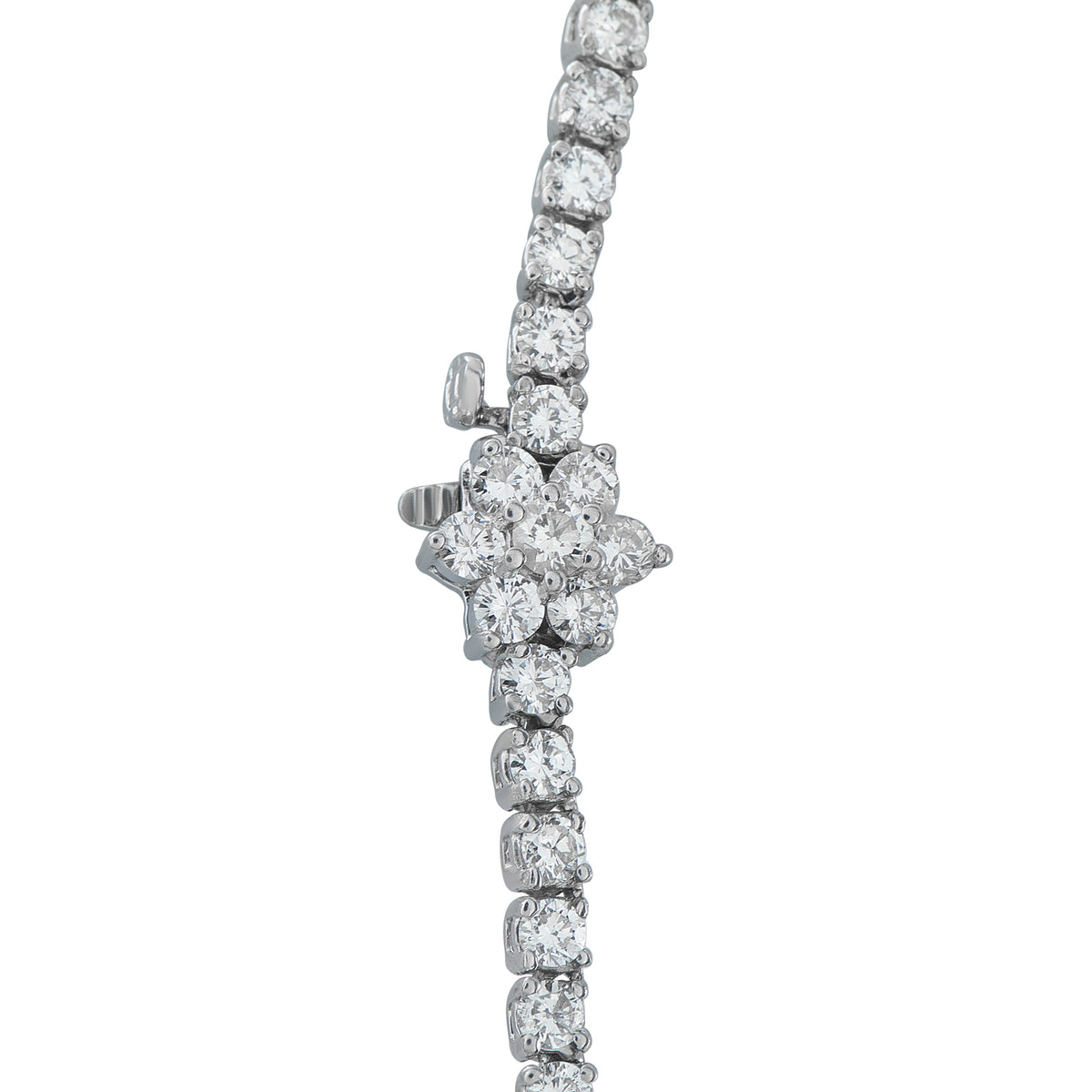Diamond tennis necklace segment with pavé round stones and prong details