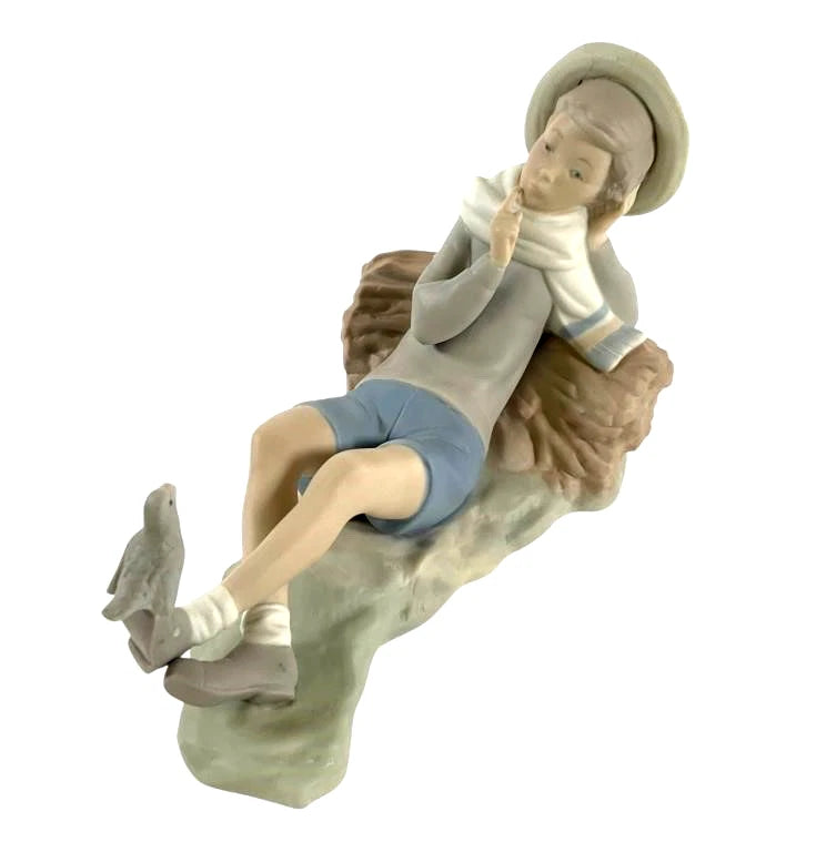 Lladro  Vintage Limited Edition  Shepherd with Bird #4730 – Lladro porcelain figurine #4730, titled Shepherd with Bird, featu