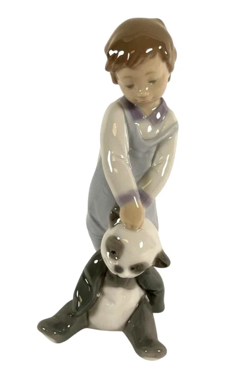 Lladro Limited Edition Porcelain First Discoveries 6974 – Porcelain figurine titled First Discoveries by Lladro, depicting a 