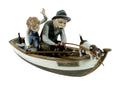 Lladro porcelain fishing grandparents figurine in a decorative boat with oars