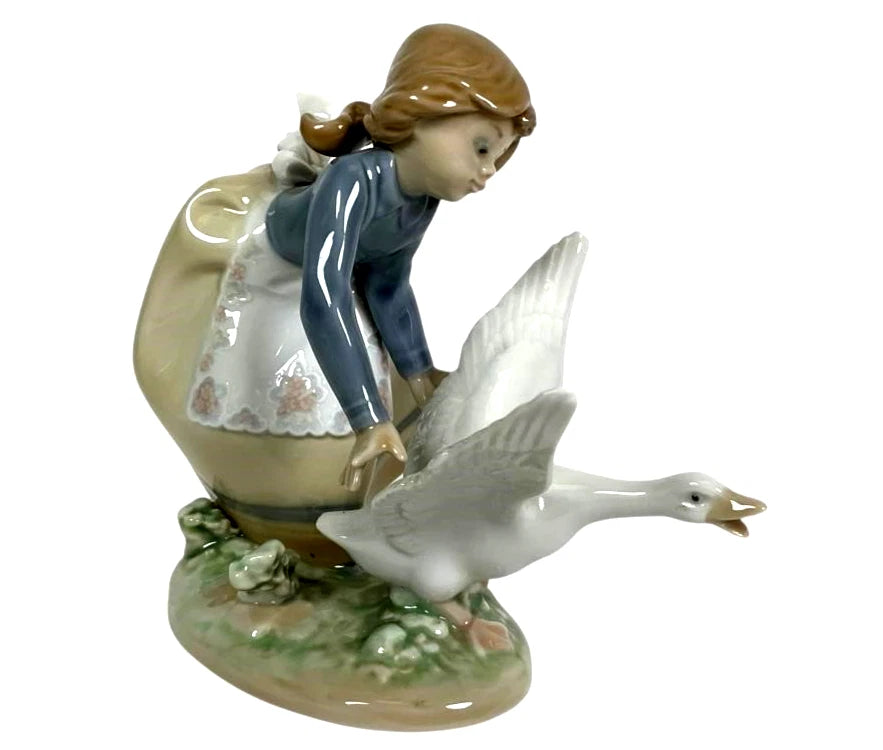 Lladro Vintage Limited Edition Wild Goose Chase Porcelain Figurine – Lladro porcelain figurine titled 'Wild Goose Chase,' mod