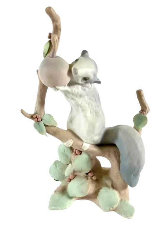 Lladro  Vintage Limited Edition Squirrel with Fruit #4774 – Lladro porcelain figurine featuring a squirrel grasping a fruit o