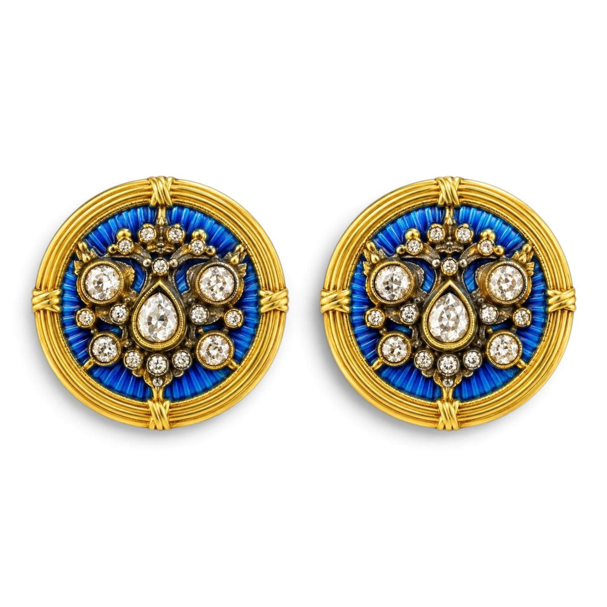 Pair of round gold-tone cufflinks with blue enamel crest and diamond-like accents